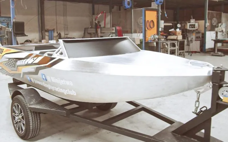 Newly completed mini jet boat on a trailer
