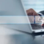 Search-Engine-Optimisation-Service-Businessman-using-a-search-engine-on-a-laptop
