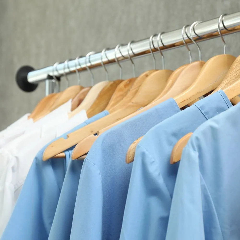 Custom-Branded-Workwear-Hospitality-workwear-in-a-rack