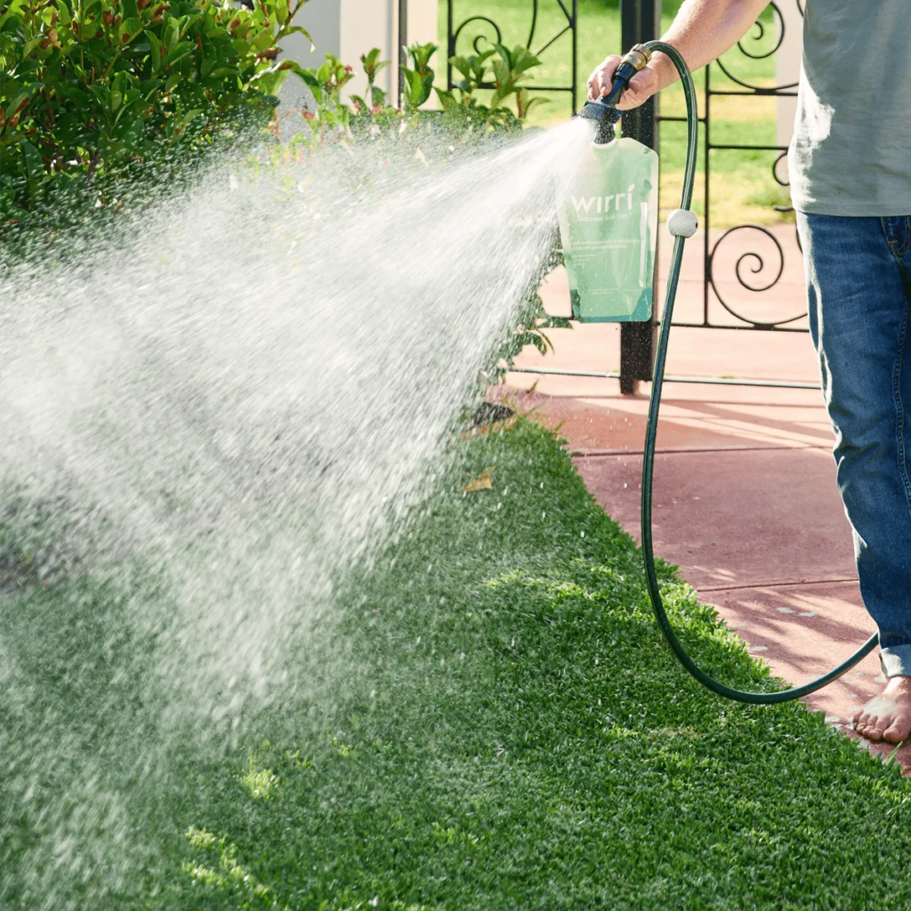 Eco-Friendly-Lawn-Care-Solutions-Taking-care-of-a-lawn-with-organic-nutrients