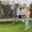 Sustainable-gardening-solutions-Woman-using-lawn-products