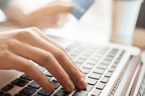 Buyer-journey-customer-using-their-credit-card-for-payment-600x400