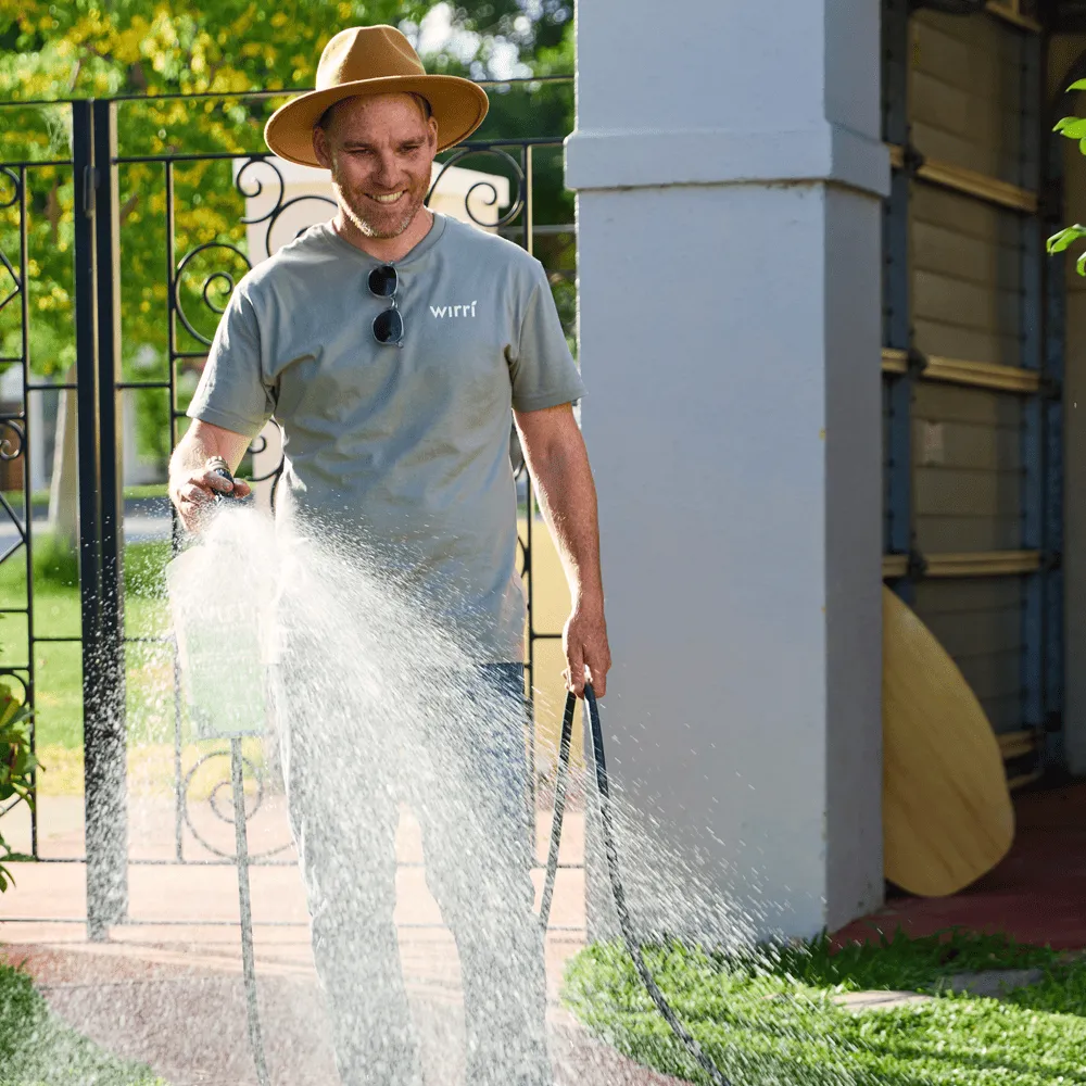 Australian-Lawn-Care-Man-using-lawn-care-product