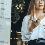 Marketing-Strategy-Woman-discussing-a-viable-strategy-with-a-team-600x400