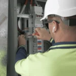 Preventative-Electrical-Maintenance-Man-working-in-a-strata-building