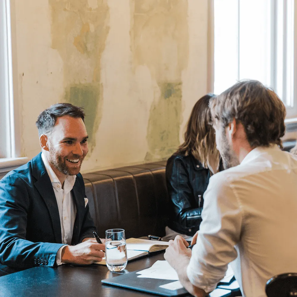 In-the-Trenches-Podcast-Russell-Smith-talking-with-a-client