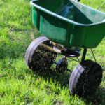 Green colored fertiliser spreader machine for Australian lawns
